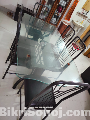 Glass Dining Table with six chairs.